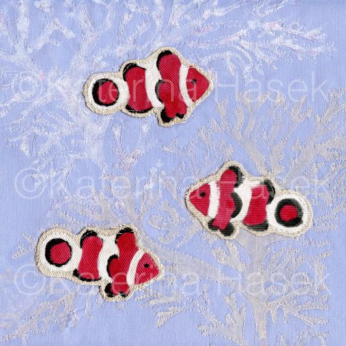 an applique image of three clownfish