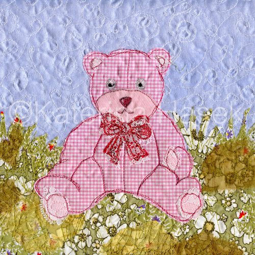 An applique image of pink teddy